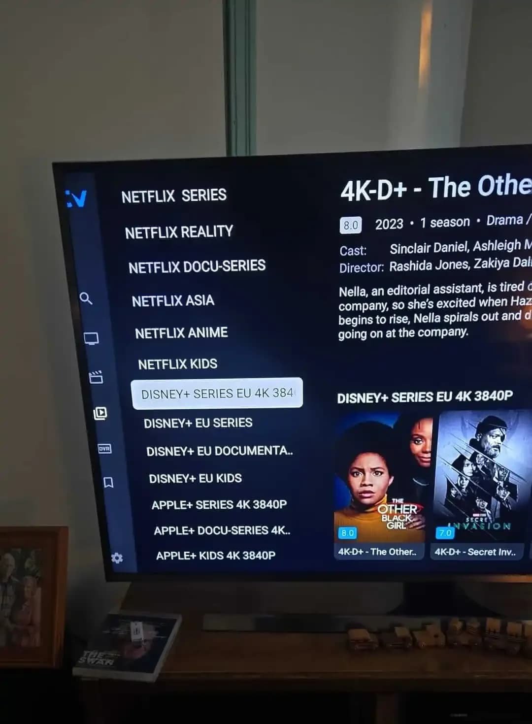 Living room setup with Rove IPTV service on screen